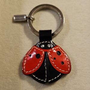 COACH VINTAGE LADYBUG KEY RING      1 1/2" WIDE X 1 3/4" HIGH